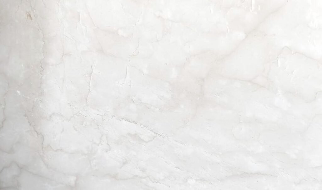 Polished Pure White Crystal Marble slab with faint light grey veining